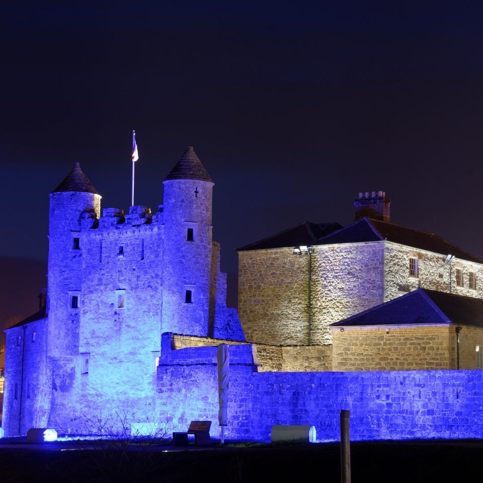 Enniskillen Castle lit up blue