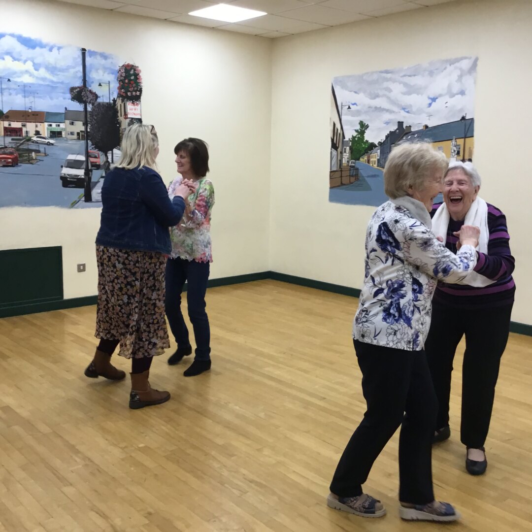 Participants enjoying dance lessons